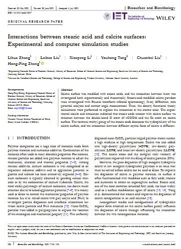 Interactions between stearic acid and calcite surfaces: Experimental and computer simulation studies