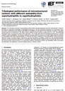 Tribological performance of microstructured surfaces with different wettability from superhydrophilic to superhydrophobic